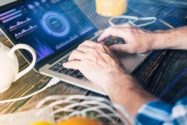 Man's hands on laptop keyboard